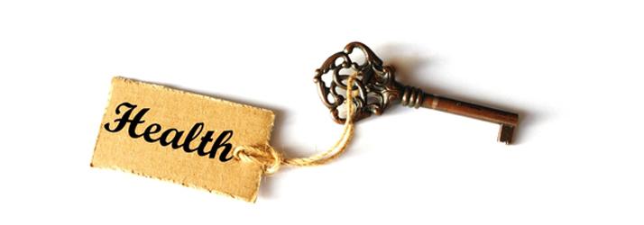 Vintage key attached to a tag reading health, symbolizing how expert chiropractic care unlocks a healthier spine in Medway.